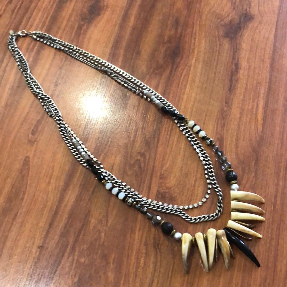 Express BoHo style long tiered necklace.